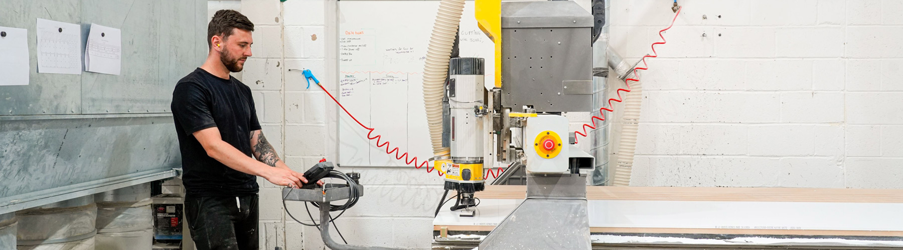 DFMK Employee on fabrication machine