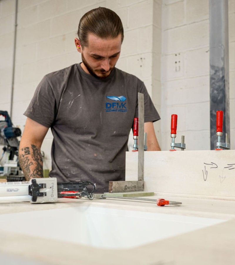 DFMK team member working on solid surface