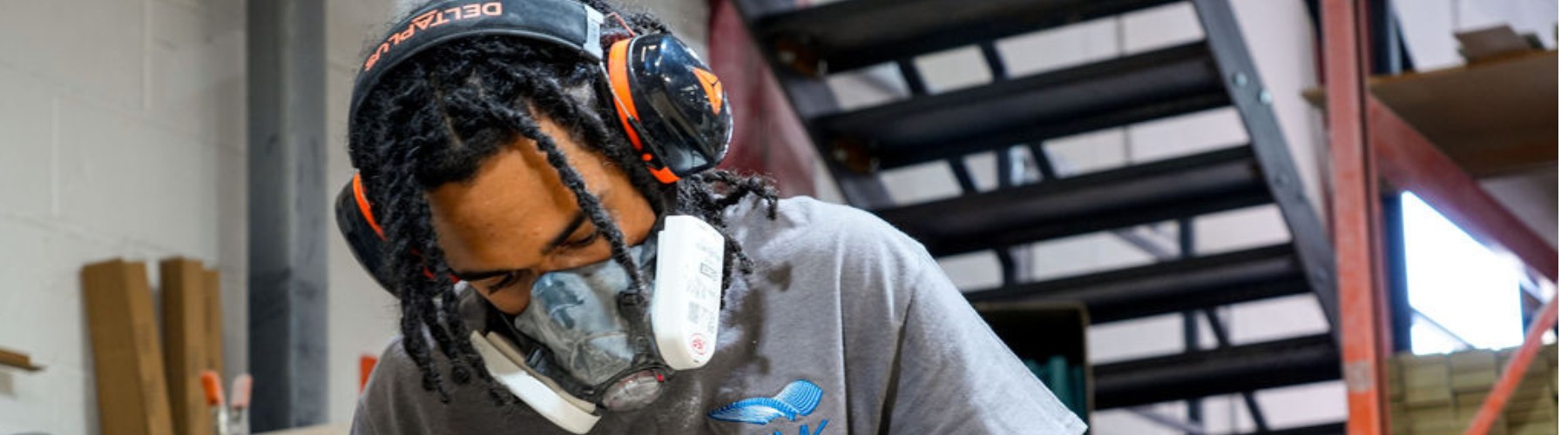 DFMK fabricator working with mask on